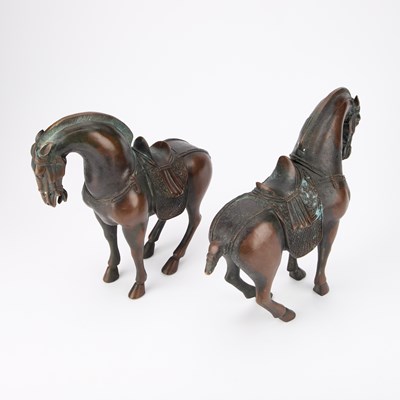Lot 146 - A PAIR OF CHINESE TANG STYLE BRONZE HORSES