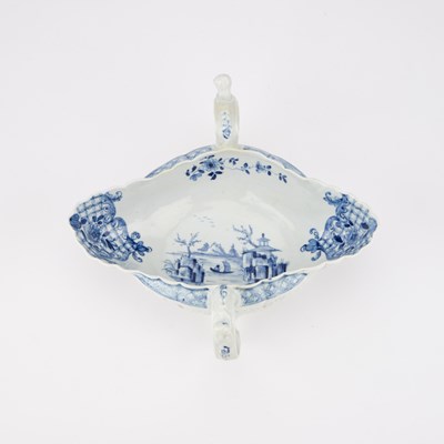 Lot 49 - A FINE WORCESTER TWO-HANDLED SAUCBOAT, CIRCA 1755