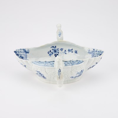 Lot 49 - A FINE WORCESTER TWO-HANDLED SAUCBOAT, CIRCA 1755