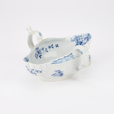 Lot 49 - A FINE WORCESTER TWO-HANDLED SAUCBOAT, CIRCA 1755