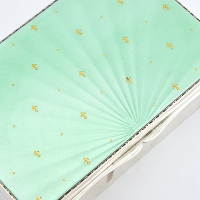 Lot 312 - A GEORGE VI SILVER AND ENAMEL CIGARETTE BOX