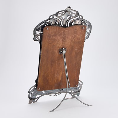 Lot 206 - WMF (WÜRTTEMBERGISCHE METALLWARENFABRIK), A LARGE ART NOUVEAU SILVERED METAL EASEL MIRROR
