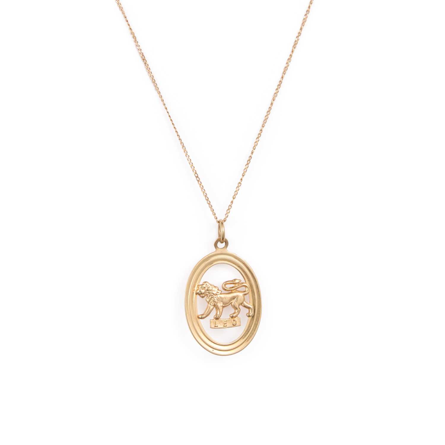 Lot A 9 CARAT GOLD LEO PENDANT ON CHAIN