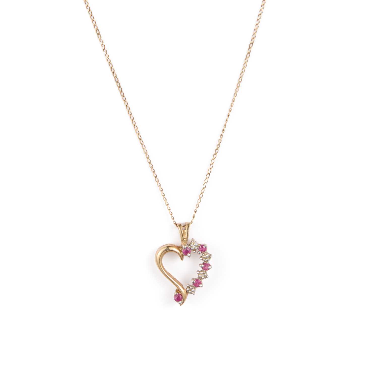 Lot A 9 CARAT GOLD RUBY AND DIAMOND HEART PENDANT ON CHAIN