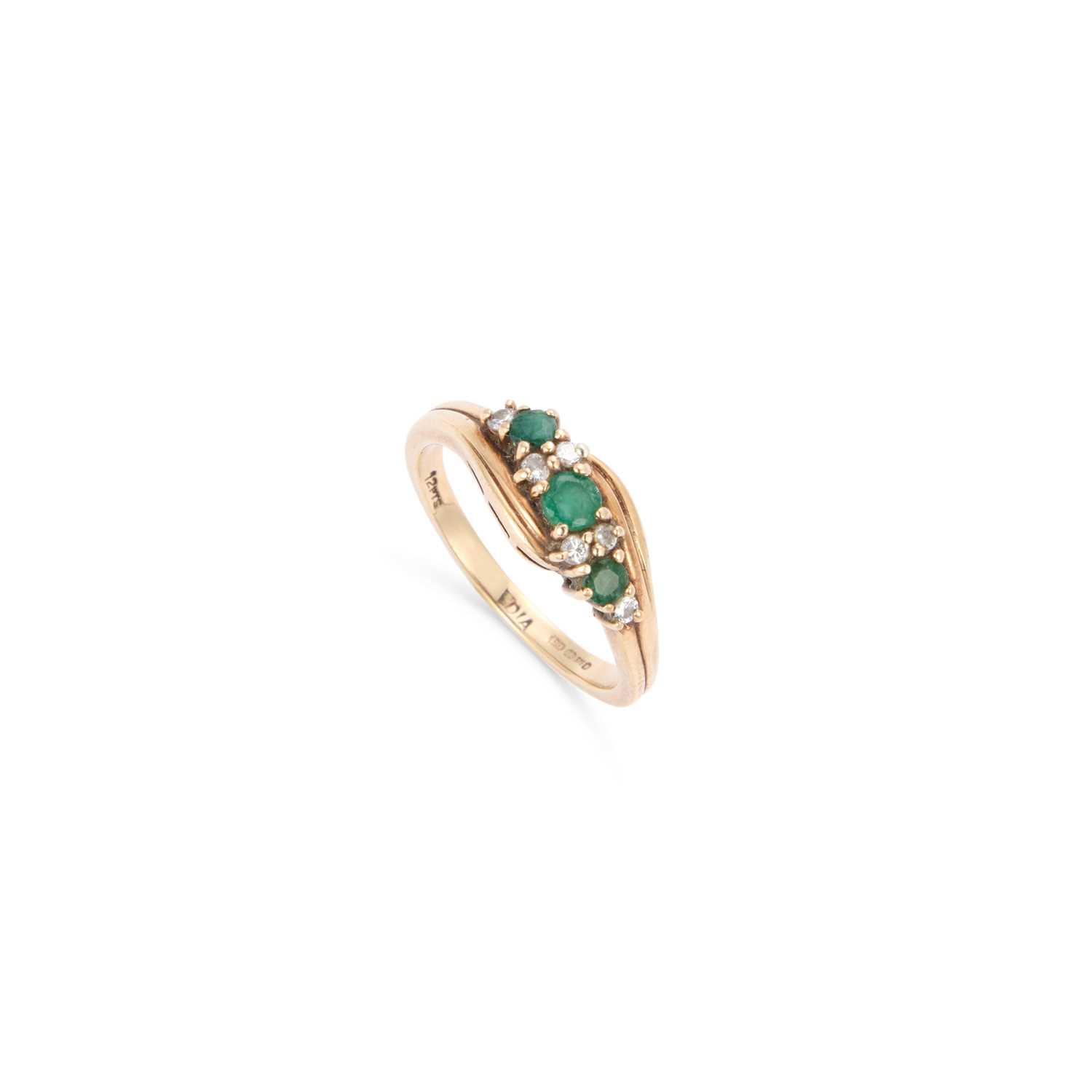 Lot A 9 CARAT GOLD EMERALD AND DIAMOND RING
