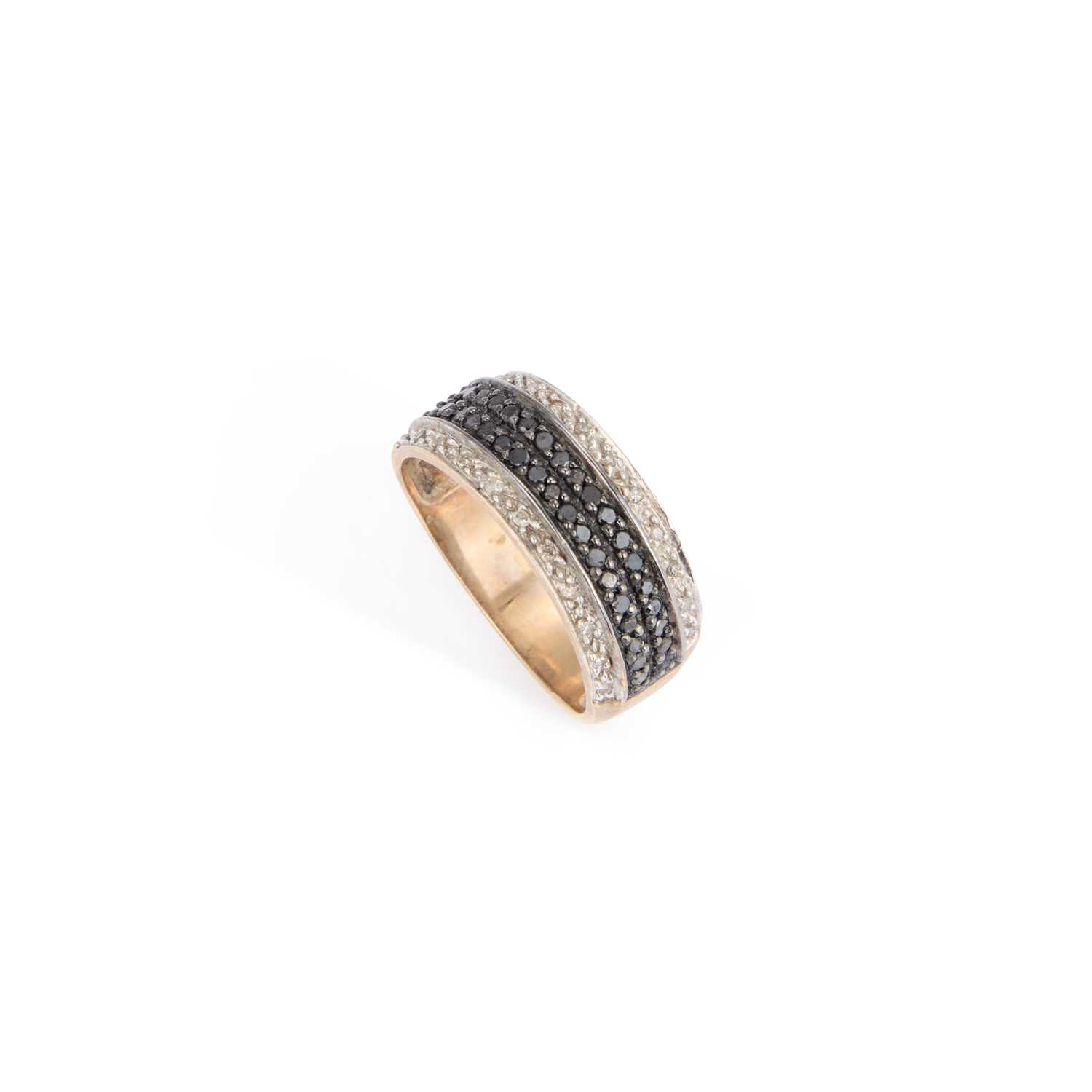 Lot A 9 CARAT GOLD BLACK AND WHITE DIAMOND BAND RING