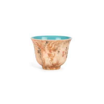 Lot 557 - A CHINESE FAUX-BOIS WINE CUP