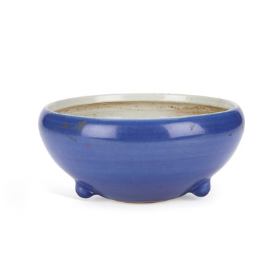 Lot 503 - A CHINESE MONOCHROME-GLAZED TRIPOD CENSER