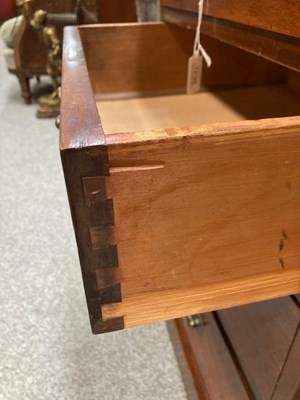 Lot A PAIR OF GEORGE III STYLE MAHOGANY BEDSIDE CHESTS