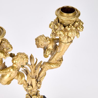 Lot A PAIR OF FRENCH GILT-BRONZE CANDELABRA, 19TH CENTURY