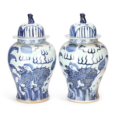 Lot 559 - A PAIR OF CHINESE JARS AND COVERS