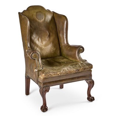 Lot 998 - A GEORGE II STYLE LEATHER WING ARMCHAIR