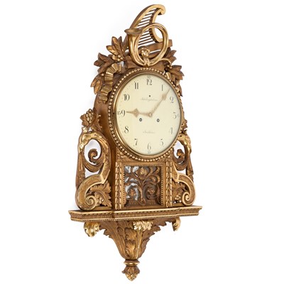 Lot 981 - A SWEDISH GILTWOOD WALL CLOCK