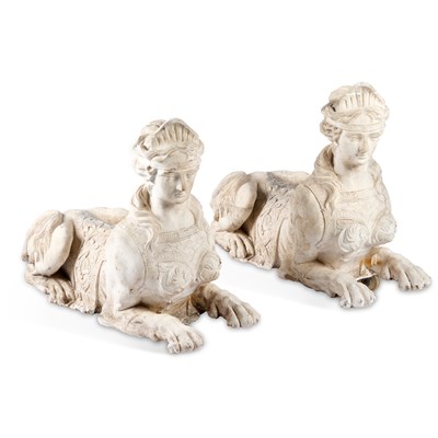 Lot 856 - A NEAR PAIR OF COMPOSITION SPHINXES
