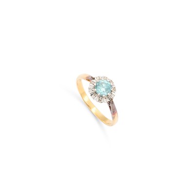 Lot 751 - A BLUE ZIRCON AND DIAMOND CLUSTER RING