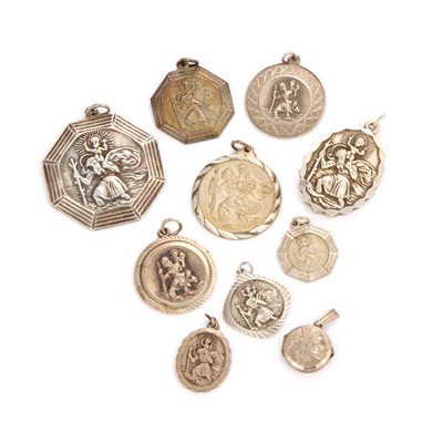 Lot 667 - A COLLECTION OF NINE GEORG JENSEN DANISH SILVER ST. CHRISTOPHER PENDANTS