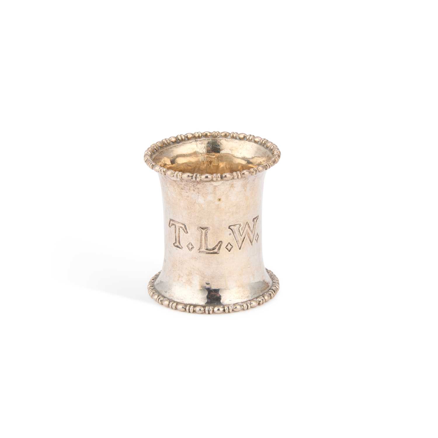 Lot OMAR RAMSDEN, AN ARTS AND CRAFTS SILVER NAPKIN RING