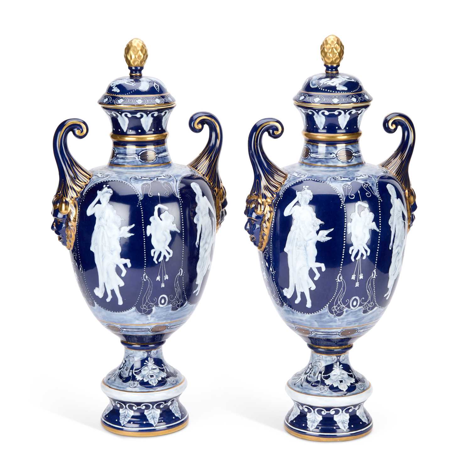 Lot A LARGE PAIR OF CONTINENTAL PORCELAIN COVERED URNS