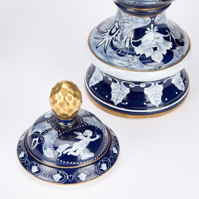 Lot A LARGE PAIR OF CONTINENTAL PORCELAIN COVERED URNS