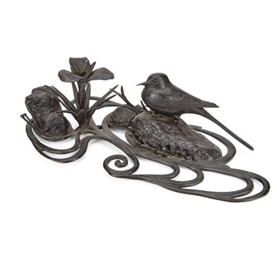 Lot 567 - A JAPANESE BRONZE OKIMONO OF A BIRD AND IRIS