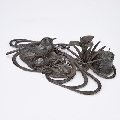 Lot A JAPANESE BRONZE OKIMONO OF A BIRD AND IRIS