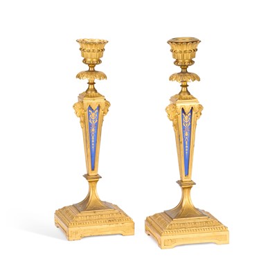 Lot 849 - A PAIR OF LOUIS XVI STYLE ORMOLU AND BLUE ENAMEL CANDLESTICKS