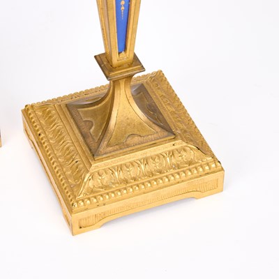 Lot A PAIR OF LOUIS XVI STYLE ORMOLU AND BLUE ENAMEL CANDLESTICKS