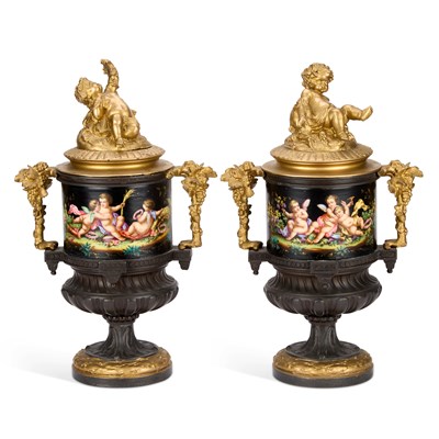 Lot 844 - A PAIR OF FRENCH PATINATED AND GILT BRONZE URNS