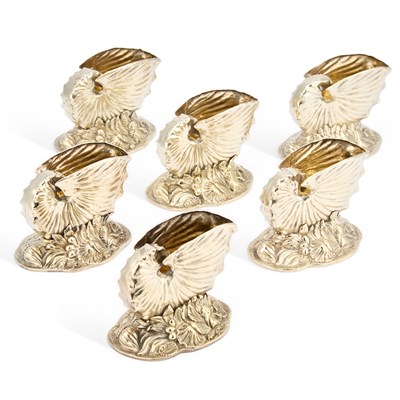 Lot 451 - A SET OF SIX VICTORIAN SILVER-GILT NAUTILUS SHELL SALTS