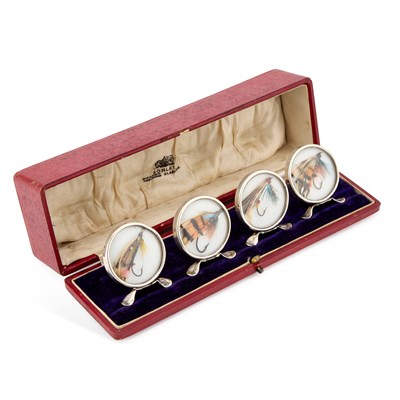 Lot 382 - A SET OF FOUR GEORGE V SILVER ANGLING MENU HOLDERS