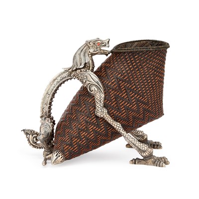 Lot 386 - A STERLING SILVER AND RATTAN WINE BOTTLE HOLDER