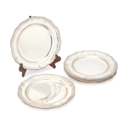 Lot 471 - A SET OF EIGHT GEORGE III SILVER DINNER PLATES