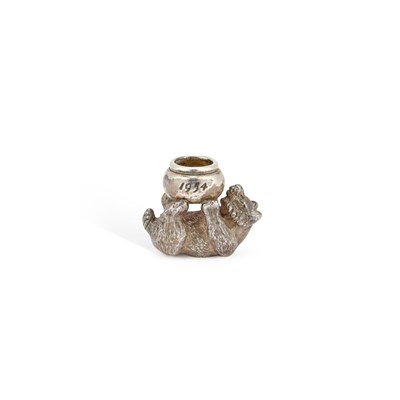 Lot 333 - AN ELIZABETH II SILVER NOVELTY MODEL OF A BEAR HOLDING A HONEY POT