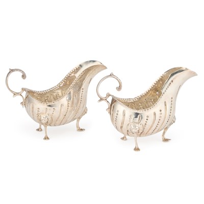 Lot 313 - A PAIR OF GEORGE III IRISH SILVER SAUCE BOATS