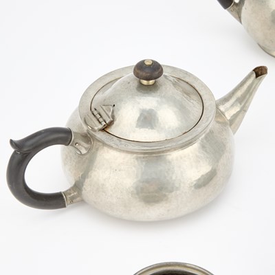 Lot A LIBERTY & CO TUDRIC PEWTER FOUR-PIECE TEA SERVICE
