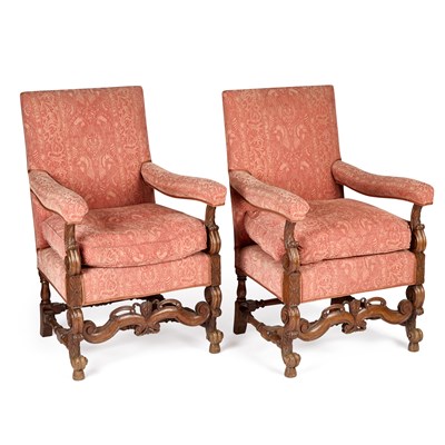 Lot 1030 - A PAIR OF 19TH CENTURY CARVED OAK AND UPHOLSTERED ARMCHAIRS