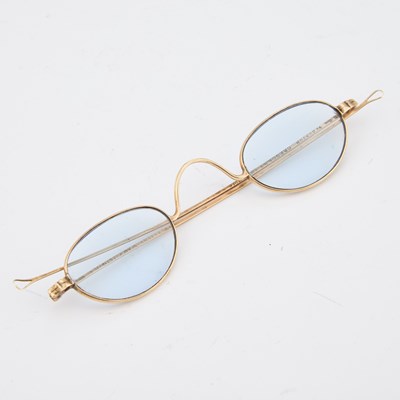 Lot A PAIR OF VICTORIAN GOLD SPECTACLES