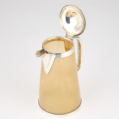 Lot A LATE VICTORIAN SILVER-MOUNTED HORN JUG