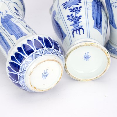 Lot A GROUP OF FIVE BLUE AND WHITE 'FIGURAL' PORCELAIN VASES