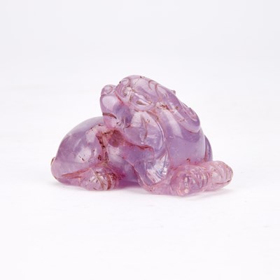 Lot A CHINESE AMETHYST CARVED LION DOG