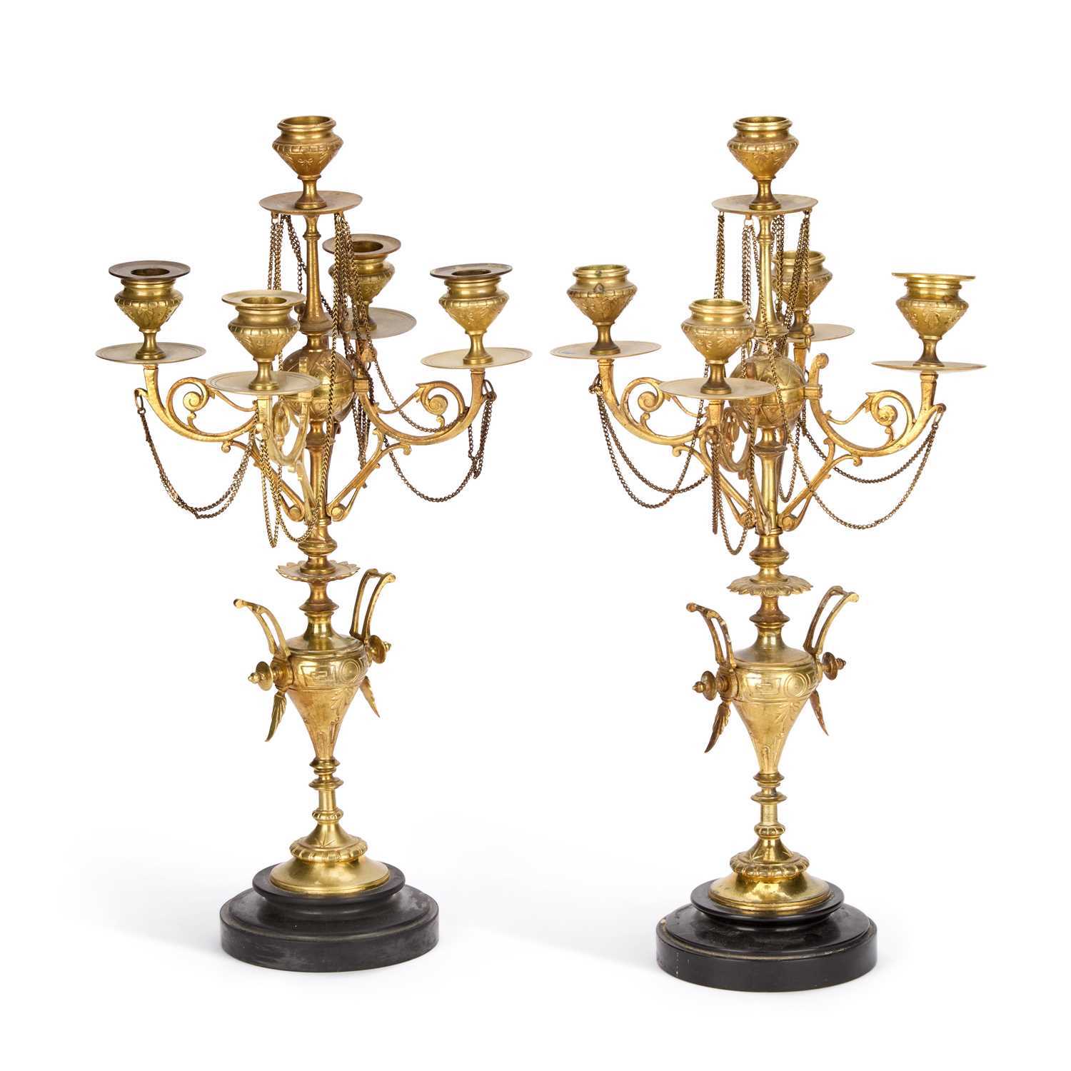 Lot A PAIR OF VICTORIAN BRASS FIVE-LIGHT CANDELABRA