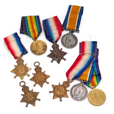 Lot 33 - TWO FIRST WORLD WAR MEDAL TRIOS